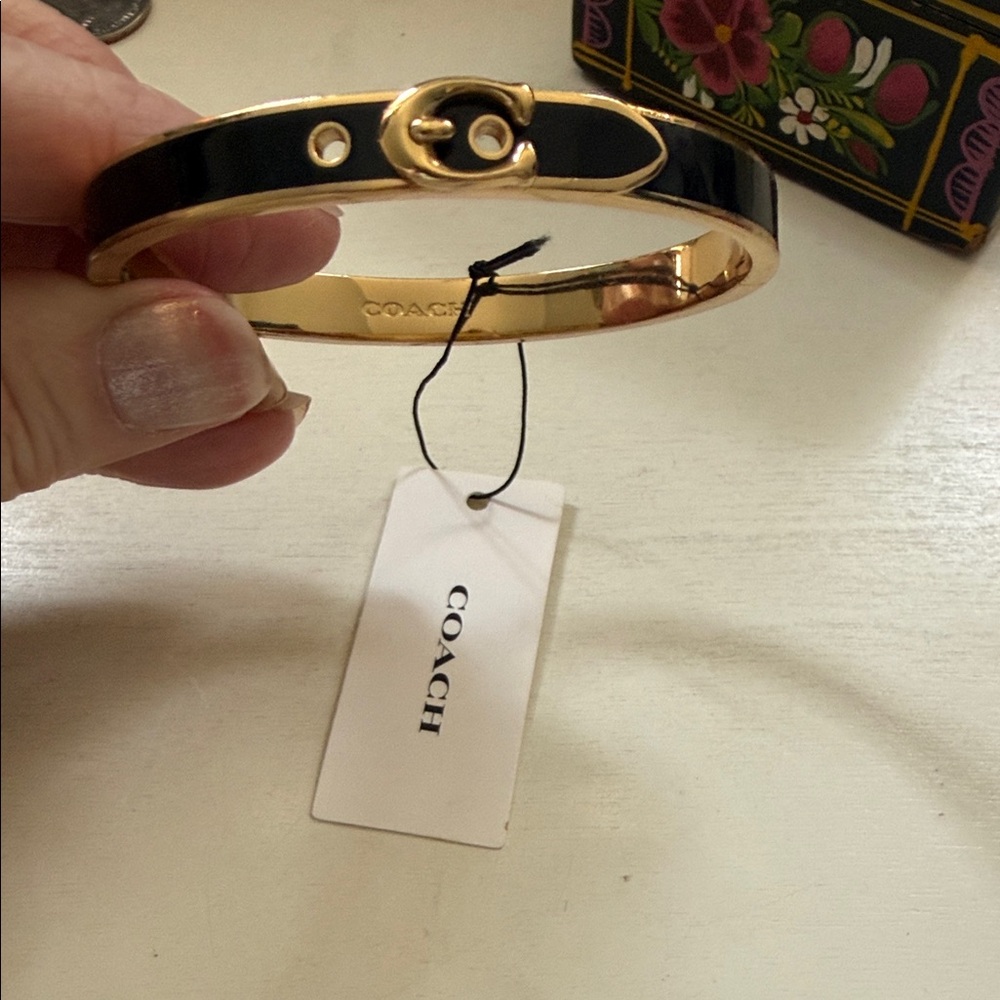 Coach Black Enamel and Gold-Tone Signature Hinge Bangle